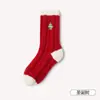 Calcetines navideños de Amazon transfronterizos para mujer, calcetines de piso gruesos de felpa de invierno con aislamiento térmico, venta al por mayor de calcetines Zhuji
