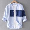Camisa de lino y algodón sin cuello de manga corta para hombre, camisa de verano con bloques de color de siete puntos y manga media, elegante y a la moda para combinar con todo.