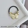 Diseño de nicho personalidad aleación cóncavo-convexo elástico anillo para el pelo todo-partido viento frío geométrico cuerda para el pelo retro temperamento cuerda para la cabeza