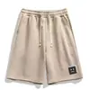 Pantalones Cortos de Verano para Hombre 2026 Nuevos Pantalones Cortos de Primavera con Estampado de Letras de Longitud Media Versátiles Pantalones Cortos de Cinco Puntos Casuales Transpirables Pantalones de Cuatro Puntos