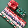 Papel de regalo de Navidad de dibujos animados varios patrones disponibles decoración navideña embalaje caja de regalo dulces al por mayor