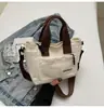 Bolso Minimalista Vintage para Mujer 2026 Nuevo de Moda Versátil Bolso para el Almuerzo Bolso Cesta de Nicho para Viajes Diarios