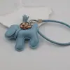 Funda para teléfono con borla de cachorro linda creativa, correa para llavero de coche, accesorio para bolso, universal para teléfonos móviles