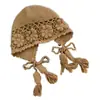 Gorro de punto de ganchillo hecho a mano estilo retro para mujer, estilo bohemio de otoño e invierno, adecuado para viajar en Sichuan, un gorro de lana