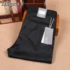 Serie Z Jie Jia Otoño Nuevo grosor medio Cuatro Estaciones sin planchar antiarrugas Tencel suave elástico algodón casual de negocios pantalones para hombre