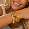 Pulsera de Acero de Titanio de Venta Caliente Transfronteriza Europea y Americana Pulsera Sencilla para Mujer tk Pulsera de Uña de Cuatro Hojas de Venta Caliente al por Mayor