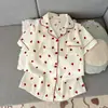 Fábrica al por mayor Pijama de algodón nube de manga corta de verano para mujer, Pantalones cortos cómodos y modernos que se pueden usar afuera, Conjunto de ropa para el hogar