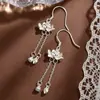 S999 Plata Pura Dos Mundos Ganchos para la Oreja de Loto para Mujer Nuevo Estilo Chino Pendientes de Borla de Loto para el Cuidado del Agujero de la Oreja Pendientes de Plata Pura