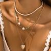 NZ2881 Colgante de amor transfronterizo europeo y americano con costuras turquesas, collar de perlas para mujer, collar apilado de nicho retro, marea
