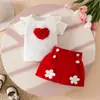 Comercio exterior verano dulce niña bebé 3D gran corazón chaqueta de manga corta aplique hebilla decorativa shorts traje de dos piezas