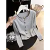 Cardigã de tricô color-block estilo coreano para mulheres, nova coleção de outono de 2026, modelagem solta estilo coreano, emagrecedor, elegante e doce, casaco suéter moderno