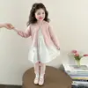 Conjunto de Dos Piezas de Falda de Algodón y Cárdigan Estilo Coreano para Niñas 2026 Nuevo Conjunto de Moda Estilo Coreano para Niñas Pequeñas Moderno