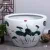 Tanque grande de patio de porcelana azul y blanca de Jingdezhen tanque de agua tanque de peces dorados cuenco de loto maceta de loto lirio de agua tanque de tortugas tanque de tortugas de hotel