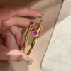 Pulsera de Corindón Rojo Vintage Dorada con Diseño de Lágrimas Azules, Incrustada con Paraíba, Pulsera de Apertura de Resorte para Mujer