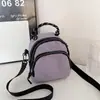 Nova Mini Bolsa Pequena 2025 Bolsa de Ombro Leve Feminina Bolsa para Celular Bolsa Esportiva Masculina e Feminina Estilo Coreano Fashion Bolsa para Uso Externo