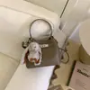 Bolsos de Lujo para Mujer 2025 Nuevo Invierno Súper Populares Bolsos de Mano Pequeños para el Trabajo Moda Retro Bolso Cruzado de Hombro Único Tipo Cubo