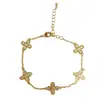 Moda Coreana y Japonesa Dulce Versátil Pulsera de Flor de Cuatro Hojas de Zirconia, Elegante Lujo Ligero Diseño Simple, Joyería Súper Brillante al por Mayor