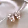 Brincos de pérolas de flor de agulha de prata Novo nicho Estilo coreano Design leve Luxo High-end Ear Studs Elegante All-match Ear Jewelry