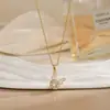 Colar para Mulheres, Flor de Zircônia Bauhinia Giratória da Moda Nicho Moda Novo Design Pingente Titânio Aço Colar de Temperamento