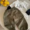 Macacão Infantil Meninos 2026 Primavera/Outono Novo Estilo Calças Jogger Bebê Cor Sólida Casual Calça Longa Meninas Estiloso Versátil