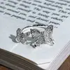 Anillo Abierto Mariposa con Lazo de Piedra Imitación Ojo de Gato Fresco y Delicado Estilo Hada con Diamantes Incrustados, para Apilar, con un Toque Exclusivo de Alta Gama