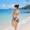 Nuevo traje de baño para mujer con un toque de alta gama, cuadros retro americanos, bikini de tiro alto adelgazante para chica hot para aguas termales y vacaciones