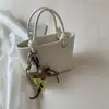 Bolso Retro Nicho con Patrón Tejido para Mujer 2025 Nueva Moda Versátil Bolso Cruzado Exquisito Super Popular Bolso de Mano Pequeño