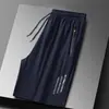 Pantalones Cortos Casuales de Seda de Hielo para Hombre Elásticos de Aire Acondicionado Pantalones Deportivos Juveniles de Secado Rápido Transfronterizos Delgados Pantalones de Playa