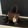 Bolso de Mano de Alto Valor Estilo Coreano para Mujer Otoño 2026 Nuevo Bolso de Hombro para el Trabajo Moda Simple Nicho Bolso de Hombro Cruzado