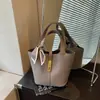 Bolso Estilo Coreano Bolso Cesta de Verduras 2026 Nuevo Moda Verano Bolso Cubo con Patrón de Lichi Bolso Cruzado de Color Sólido de Alto Valor