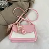 Bolso de mujer de estilo fresco bicolor, nuevo bolso cuadrado pequeño elegante y a la moda primavera/verano 2026, bolso de hombro y cruzado de alto valor estético