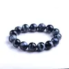 Pulsera de piedra ojo de tigre azul natural en oferta Pulsera de piedra ojo de tigre azul con patrón de rayo de los fabricantes de gemas de cristal Ketang de Guangdong