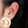 Clip de hueso de oreja simple personalidad moda geométrico microincrustado circonita pendientes sin perforar temperamento estilo frío x clip de oreja cruzado