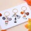 Colgantes de llavero de Halloween transfronterizos europeos y americanos fantasma calavera calabaza parca aleación bolsa de aceite goteo accesorios al por mayor