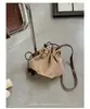 Bolso tipo cubo de alta gama, lujo ligero, vintage para mujer, nuevo modelo de otoño 2026, bolso de hombro de nicho para el día a día, bolso cruzado versátil