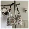 Bolsa de Tecido Bordado Nova Tendência Versátil para Mulheres, Estilo Nicho Elegante Bolsa Tote de Ombro Único