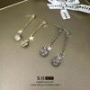 Pendientes de borla largos con estrellas distintivas de moda de Corea del Sur, pendientes de piedra de ojo de gato ligeros y elegantes de nicho para mujer