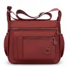 2026 Bolsa Transversal Repelente à Água Multicamadas Grande Capacidade Mochila de Ombro Único Feminina Casual Leve Tecido de Nylon Bolsa para Mãe