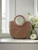 Bolsa de paja tejida a mano de alto volumen para tienda nueva, bolso de mano de media luna para mujer, bolso cruzado, bolso tipo cubo redondo, bolsa versátil de cesta de verduras