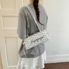 Bolso de lunares de nicho para chica dulce transfronterizo 2026 Nueva moda Bolso de hombro para ir al trabajo Bolso de mano Bolso baguette