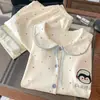 Pijama de forro polar estilo dulce con nudo de mariposa, nuevo conjunto de cárdigan de manga larga de moda otoño/invierno para mujer