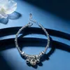 Pulsera de plata pura en espiral, plata 9999 pura, con cascabeles, Dios de la Fortuna, cuentas de la suerte y trozos de plata fragmentada. Un regalo para una novia en San Valentín