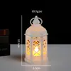 Lámpara de viento hexagonal retro navideña transfronteriza lámpara de viento electrónica LED lámpara de vela de Halloween lámpara de aceite adornos decorativos