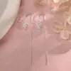 Aretes de Hilo Flor Hueca, Elegantes Aretes de Gancho Flor de Cinco Pétalos Estilo Nuevo 2026, Pendientes Elegantes y Suaves con Cadena Larga de Borlas