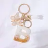 Llavero Colgante de Borla con Letra Inglesa Personalizada de Purpurina Blanca con Resina Epoxi y Colgante de Resina con Pan de Oro, Llavero Sencillo