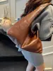 Bolsa feminina de grande capacidade transfronteiriça 2026 nova bolsa de ombro versátil para compras bolsa tote simples casual para o dia a dia