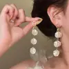 Pendientes Largos de Flor de Concha de Lujo Ligero Francés 2026 Nuevo Estilo Caliente Pendientes de Lujo de Gama Alta Estilo Vacacional Único