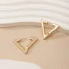 Europa y Estados Unidos triángulo de joyería transfronterizo geométrico liso hebilla de oreja de aleación aretes de personalidad nicho hebilla de oreja joyería