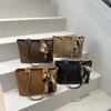 Bolso de mano retro europeo y americano de gran capacidad, nuevo bolso informal de nicho de moda, bolso de hombro sencillo, bolso tipo cubo.
