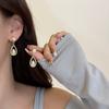 Pendientes de gota de perla con aguja de plata S925, nuevos pendientes de moda de alta gama con temperamento francés, pendientes de nicho al por mayor para mujeres